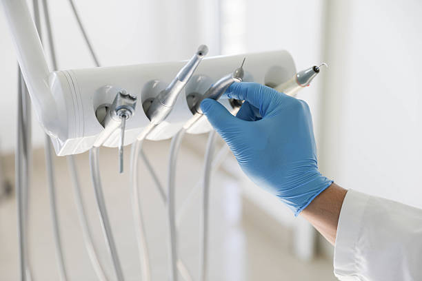 Professional Tooth Extraction technician working in La Follette, TN